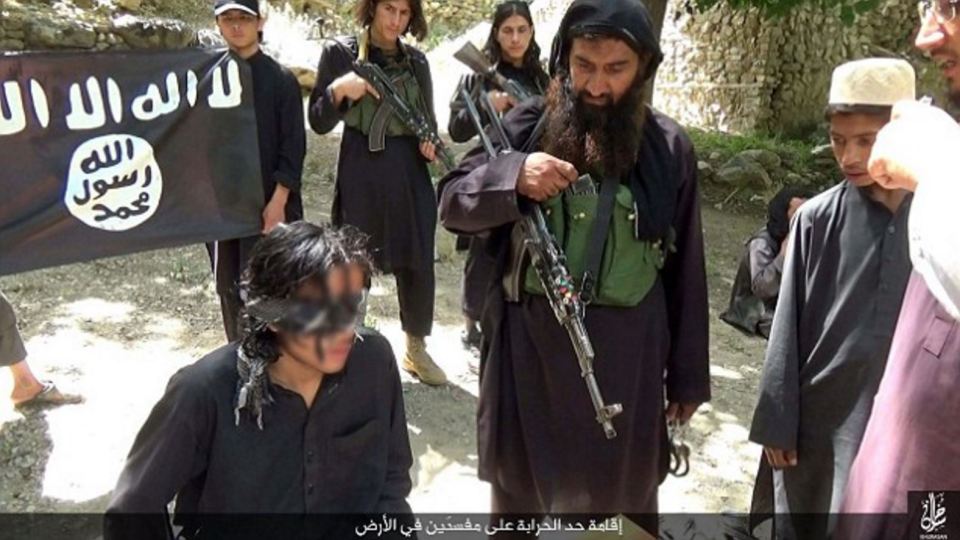 Grabs taken from an ISIS video where they have amputated and alleged thief