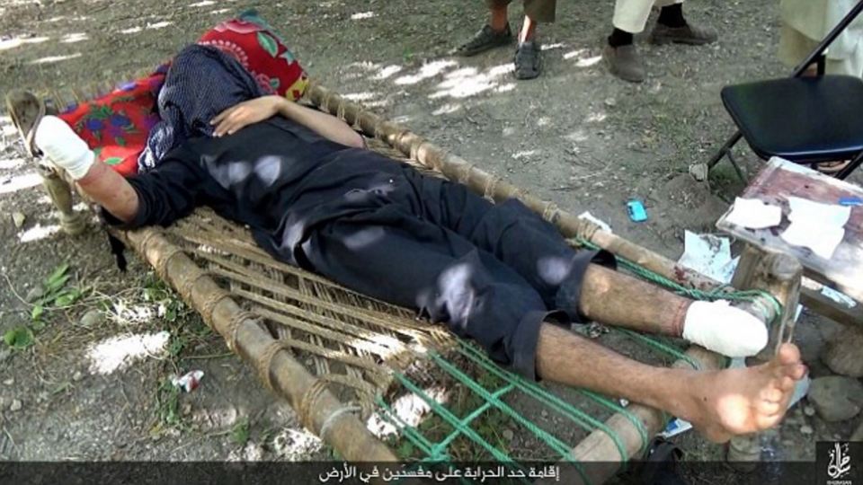 Grabs taken from an ISIS video where they have amputated and alleged thief