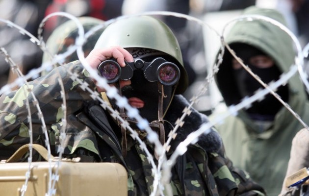 Οι ρωσόφωνοι στα οδοφράγματα περιμένουν τα ουκρανικά τανκς