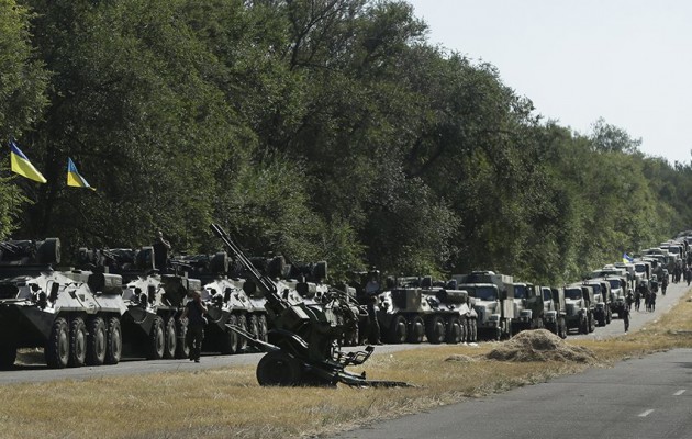 Φωτορεπορτάζ: Οι Ουκρανοί παίρνουν θέσεις μάχης στη Μαριούπολη