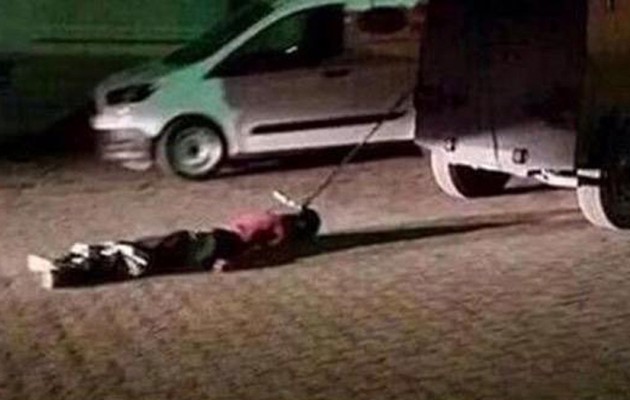 Κτηνωδία: Τούρκοι αστυνομικοί σέρνουν το πτώμα Κούρδου στους δρόμους! (βίντεο)