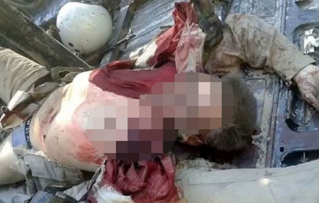 Οι Τουρκμένοι τζιχαντιστές σέρνουν το πτώμα του Ρώσου πιλότου σε καρότσα! (φωτο)