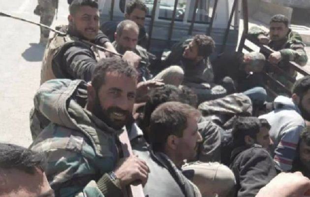 Δεκαπέντε τζιχαντιστές της Φαϊλάκ Αλ Ραχμάν παραδόθηκαν στον στρατό στην Αν. Δαμασκό (φωτο)