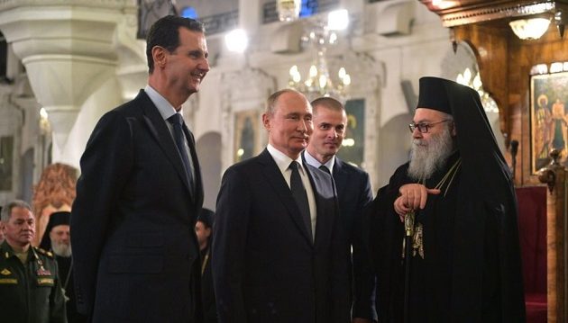 Πούτιν και Άσαντ κοροϊδεύουν τον Τραμπ εντός εκκλησίας (βίντεο)
