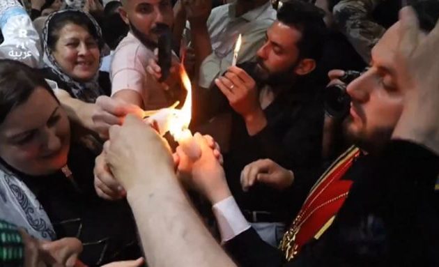 Για πρώτη φορά το Άγιο Φως μεταφέρθηκε από την Ιερουσαλήμ στο Ιράκ – Αεροπορικώς μέσω Ιορδανίας